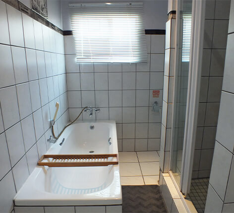 View of bathtub and shower
